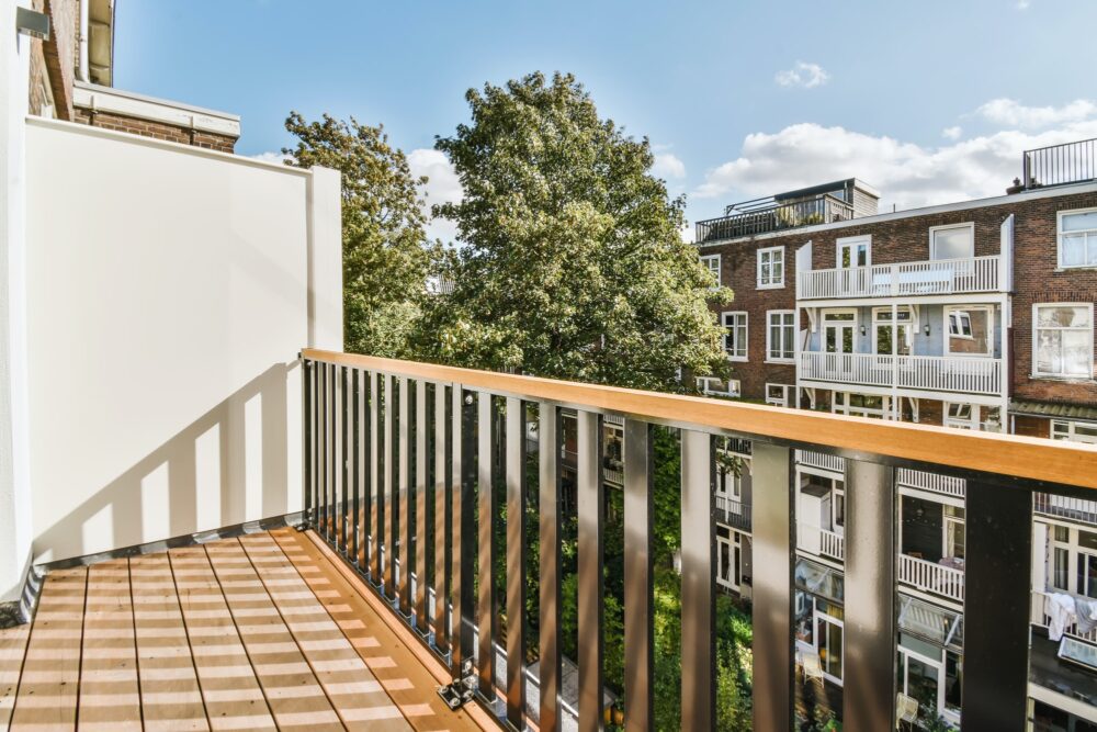 Stylish balcony with metal railings